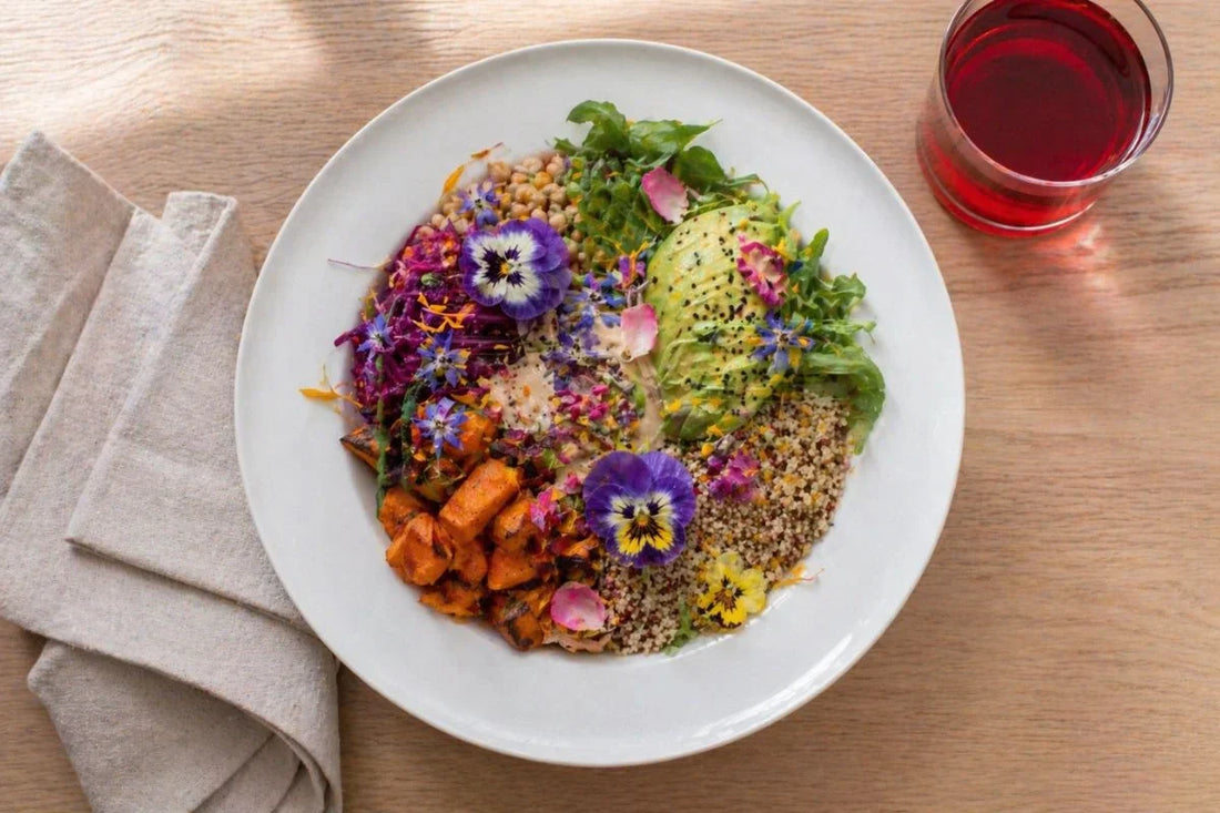 Grain bowl topped with colorful edible flowers
